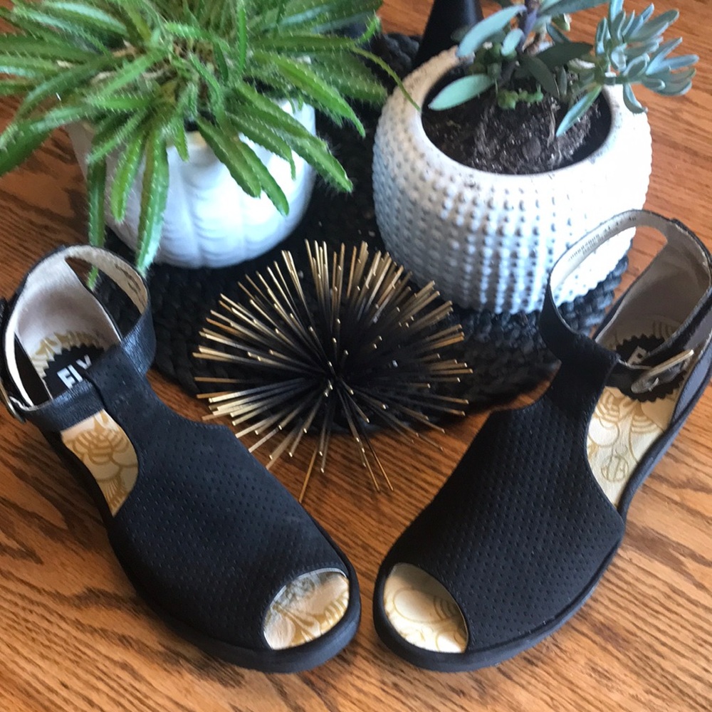 Black leather Fly London t-strap wedges